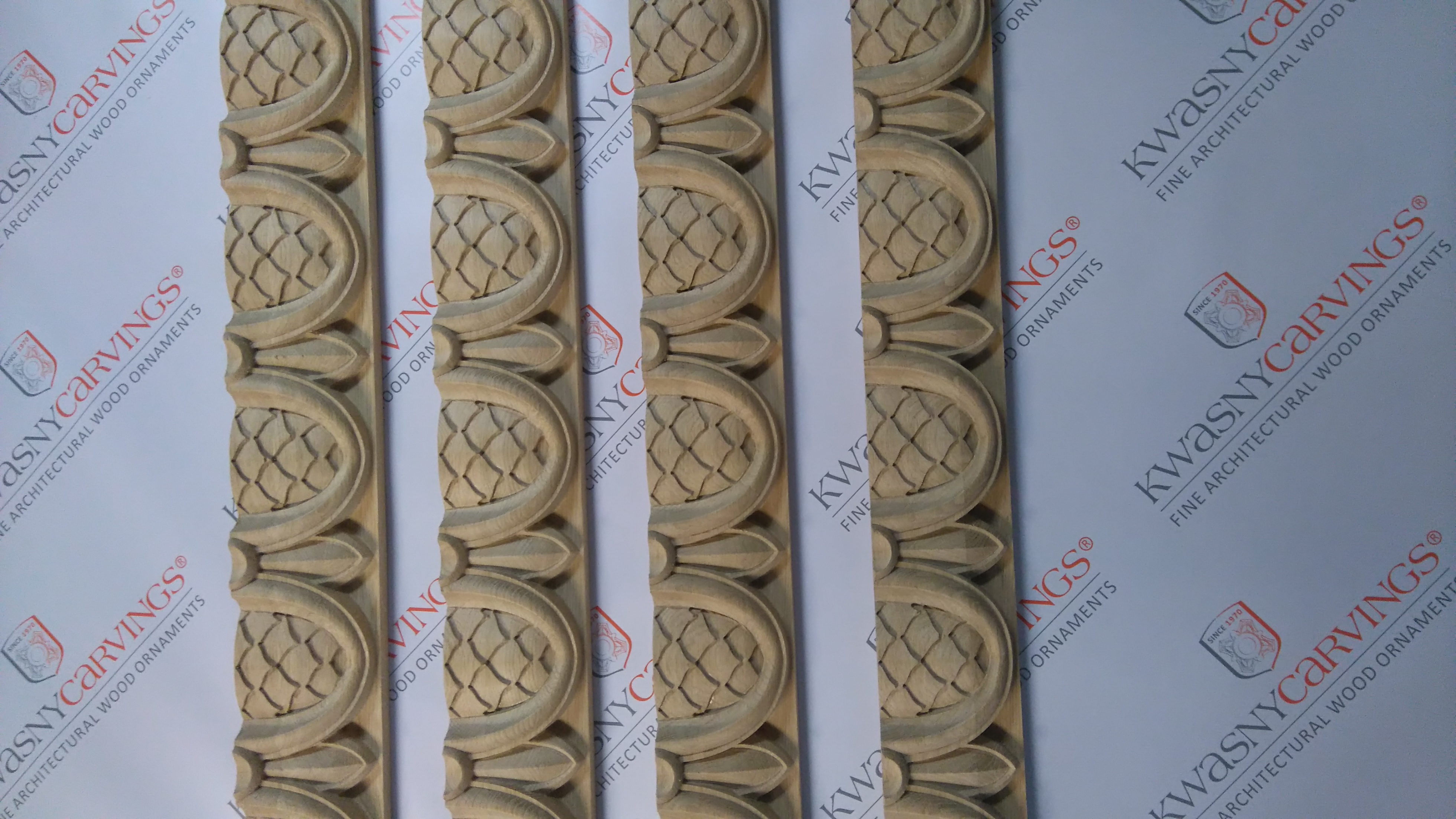 Wooden milled cornice moldings for ceiling projects.